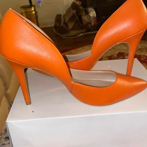 Exchange Orange Pumps